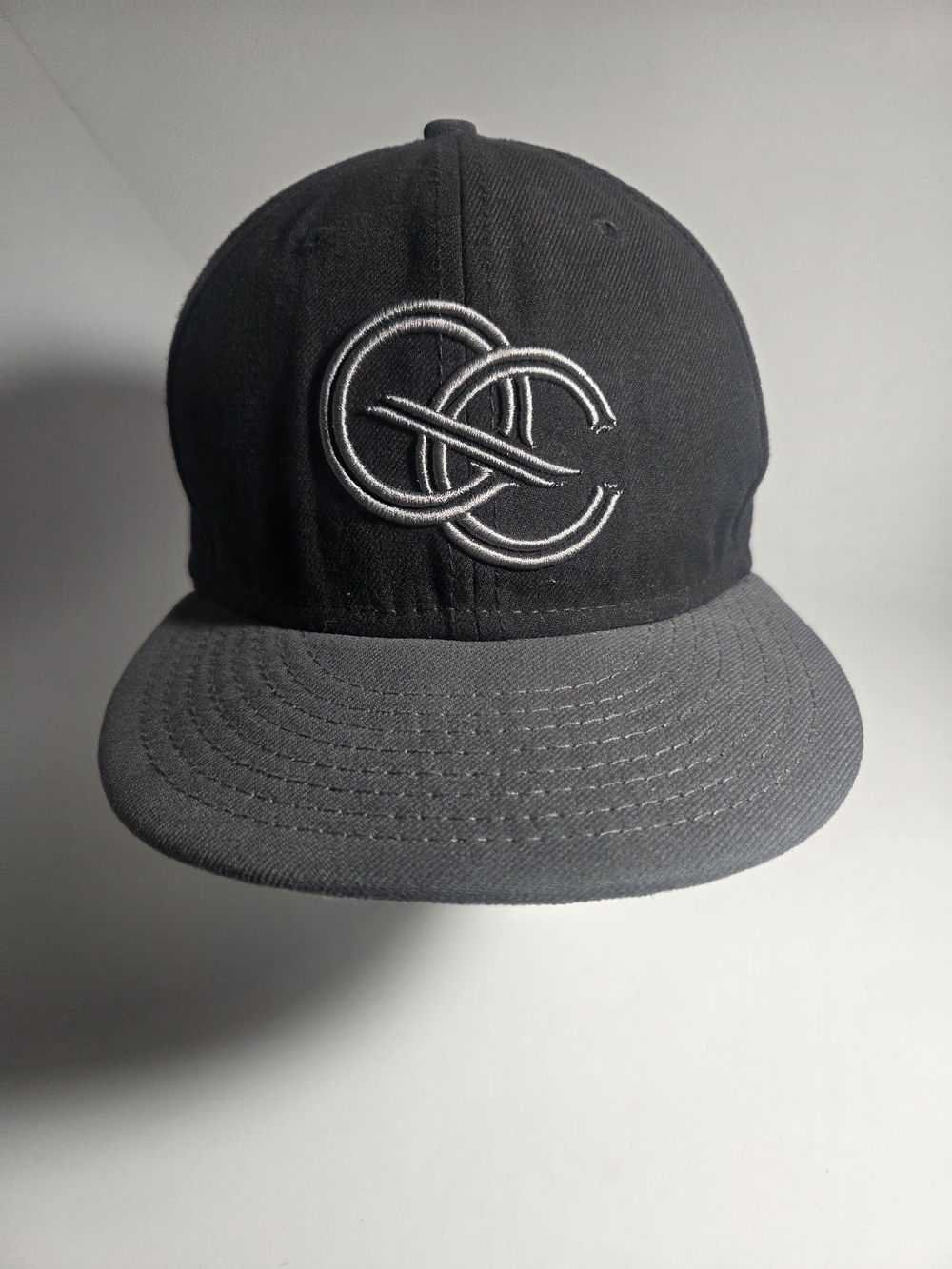 New Era Black and Gray Flat Brim Hat with White Embroidered Logo